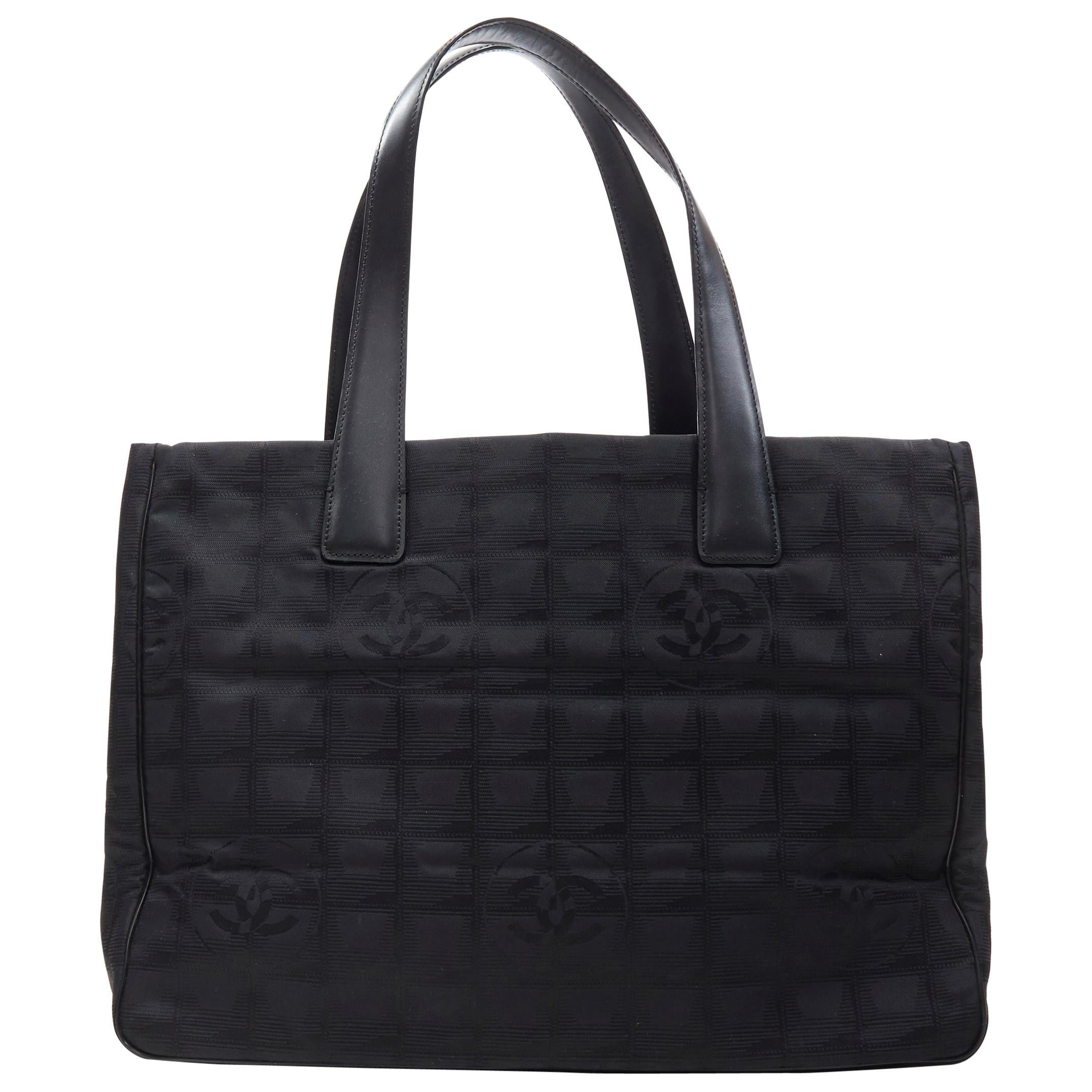 CHANEL Travel Ligne black checked CC jacquard fabric leather handle tote  bag at 1stDibs