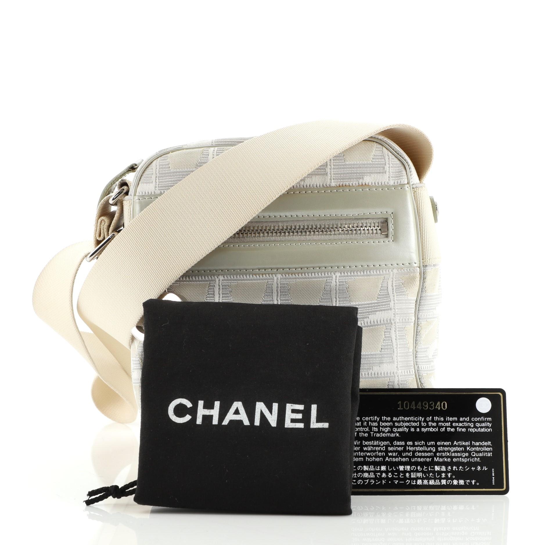 Condition: Good. Wear and creasing on exterior, scuffs on leather trims, moderate glue stains along front pocket trim and interior opening, wear and darkening on strap. Splitting on zipper pull wax edges, discoloration in interior, scratches and