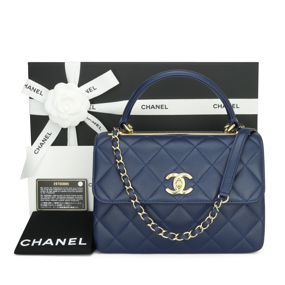 CHANEL Trendy CC Top Handle Bag Small Navy Blue Lambskin with Light Gold Hardware 2020.

This stunning bag is in excellent condition, the bag still holds its original shape, and the hardware is still very shiny.

This top handle bag is simply