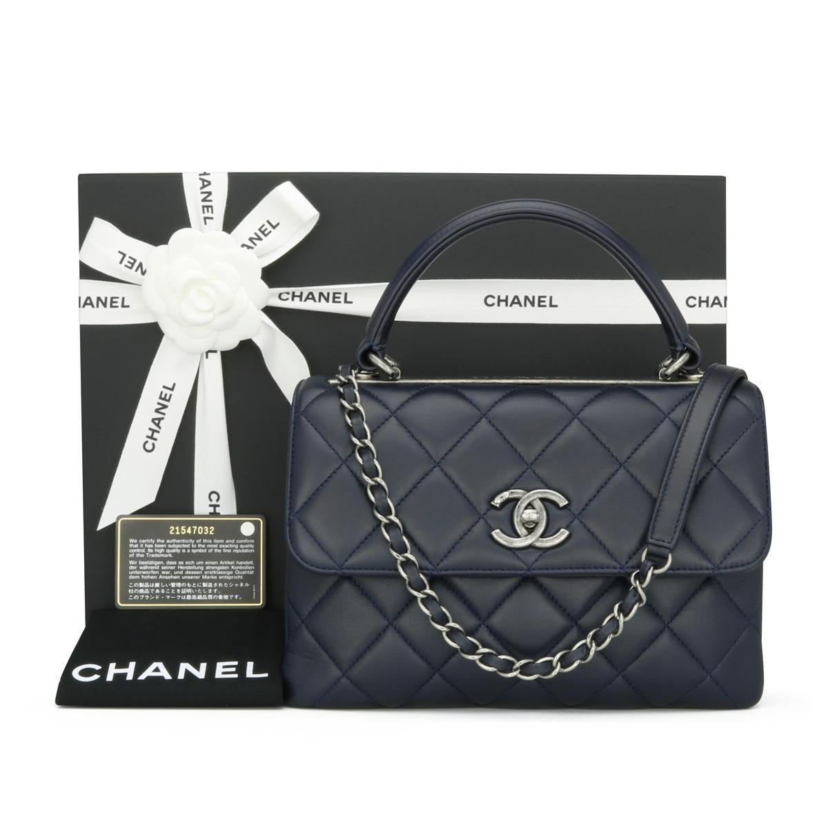 CHANEL Trendy CC Top Handle Bag Small Navy Blue Lambskin with Ruthenium Hardware 2015 – 15B.

This stunning bag is in very good condition, the bag still holds its shape very well, and the hardware is still very shiny.

This top handle bag is simply