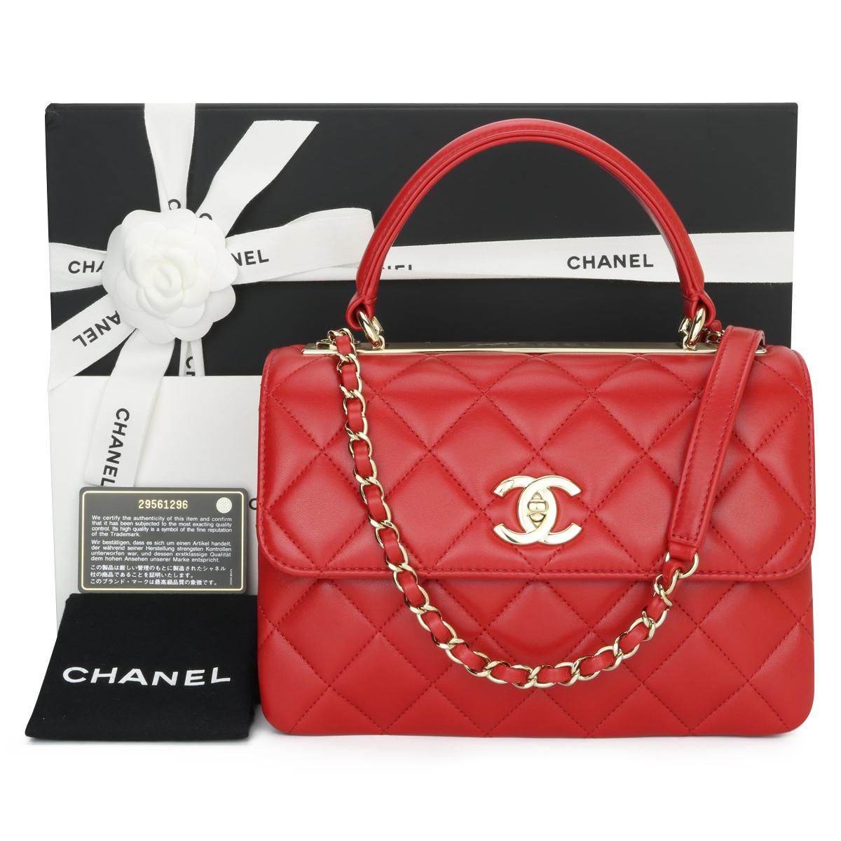 CHANEL Trendy CC Top Handle Flap Bag Small Red Quilted Lambskin with Light Gold Hardware 2020.

This stunning bag is in pristine condition, the bag still holds its original shape, and the hardware is still very shiny. The leather smells fresh as if