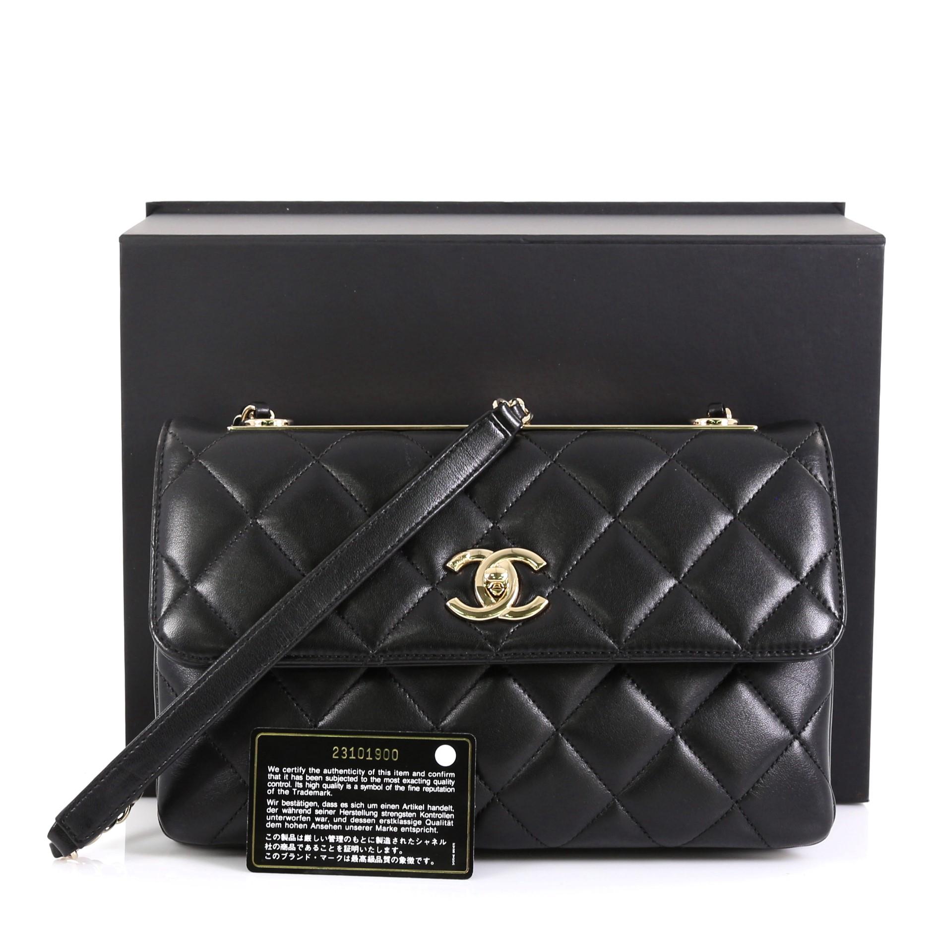 This Chanel Trendy CC Flap Bag Quilted Lambskin Medium, crafted from quilted black lambskin leather, features woven-in leather chain strap with leather shoulder pad, Chanel gold-tone nameplate on top, exterior flat back pocket, and gold-tone