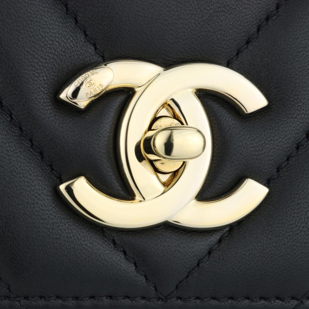 black with gold medium top zip handle bag
