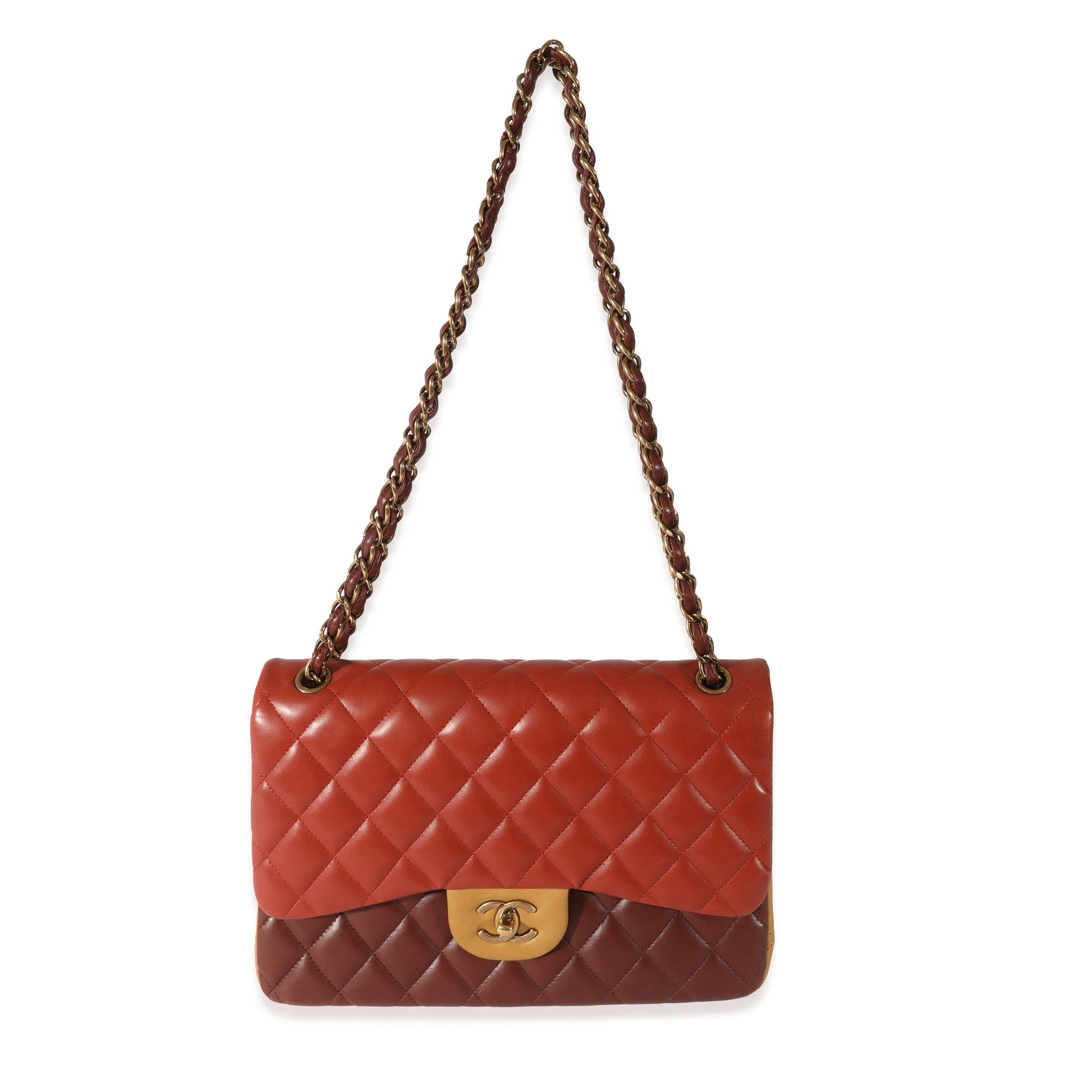 Listing Title: Chanel Tri-Color Lambskin Jumbo Double Flap Bag
 SKU: 128619
 Condition: Pre-owned 
 Condition Description: A timeless classic that never goes out of style, the flap bag from Chanel dates back to 1955 and has seen a number of updates.