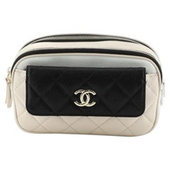 Chanel - Sac de taille en cuir de chèvre matelassée avec poche frontale CC tricolore