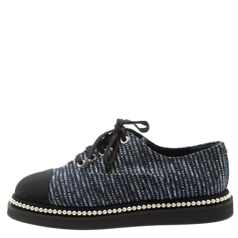 Stay casual and step out in style in these exclusive oxfords from Chanel. Crafted from canvas and fabric, these will bring out the fashion diva within you. They come with a rubber sole for an added flair and comfort. These blue beauties can make you