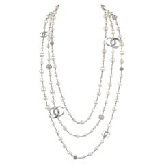 Chanel Triple Strand Pearl and Crystal CC Necklace