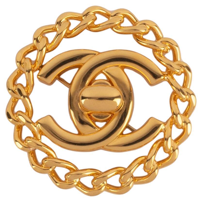 Chanel turnlock brooch