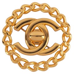 Vintage Chanel turnlock brooch