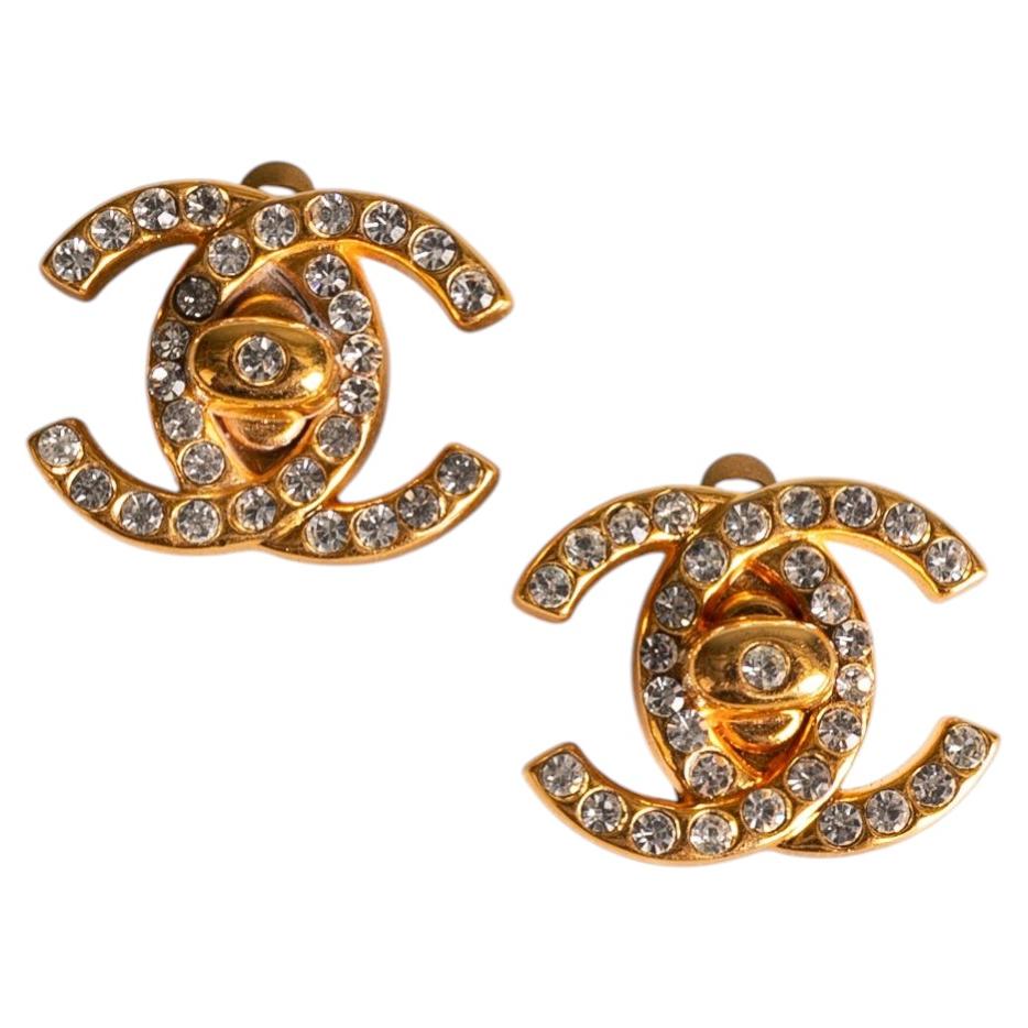 Chanel turnlock earrings by Karl Lagerfeld Fall 1996