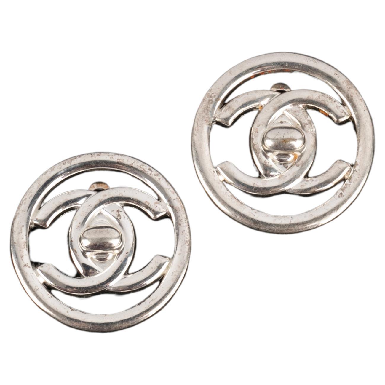 Chanel turnlock earrings For Sale