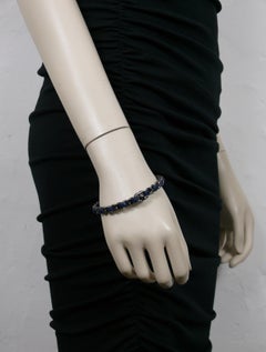 Chanel Bracelet jonc chaîne en cuir Turnlock