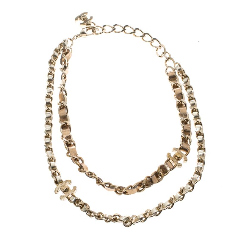 Isn't this necklace from Chanel just lovely! It is crafted from gold-tone metal and leather and features double chains which flaunt an interlocking design pattern. The iconic CC turnlock logos are creatively placed to add charm to the overall look.