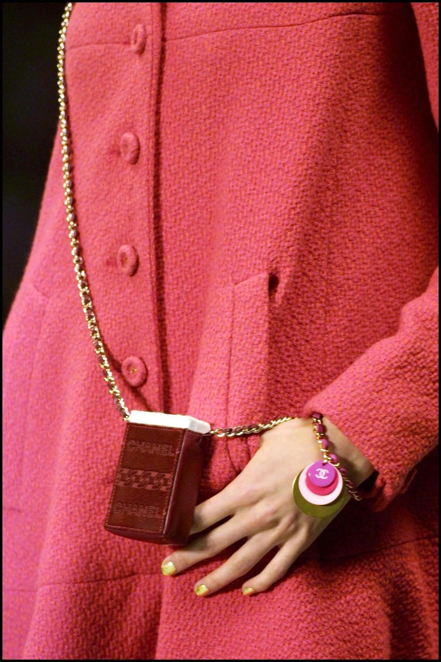 Chanel 2001 Runway Vintage Micro Mini Pouch Turquoise Blue Pony Hair Bag 

Fall 2001 

Gold hardware
Crafted in turquoise blue leather and jet black calf hair. 
Featuring a textured style,  an embossed internal logo stamp, an open top design, a