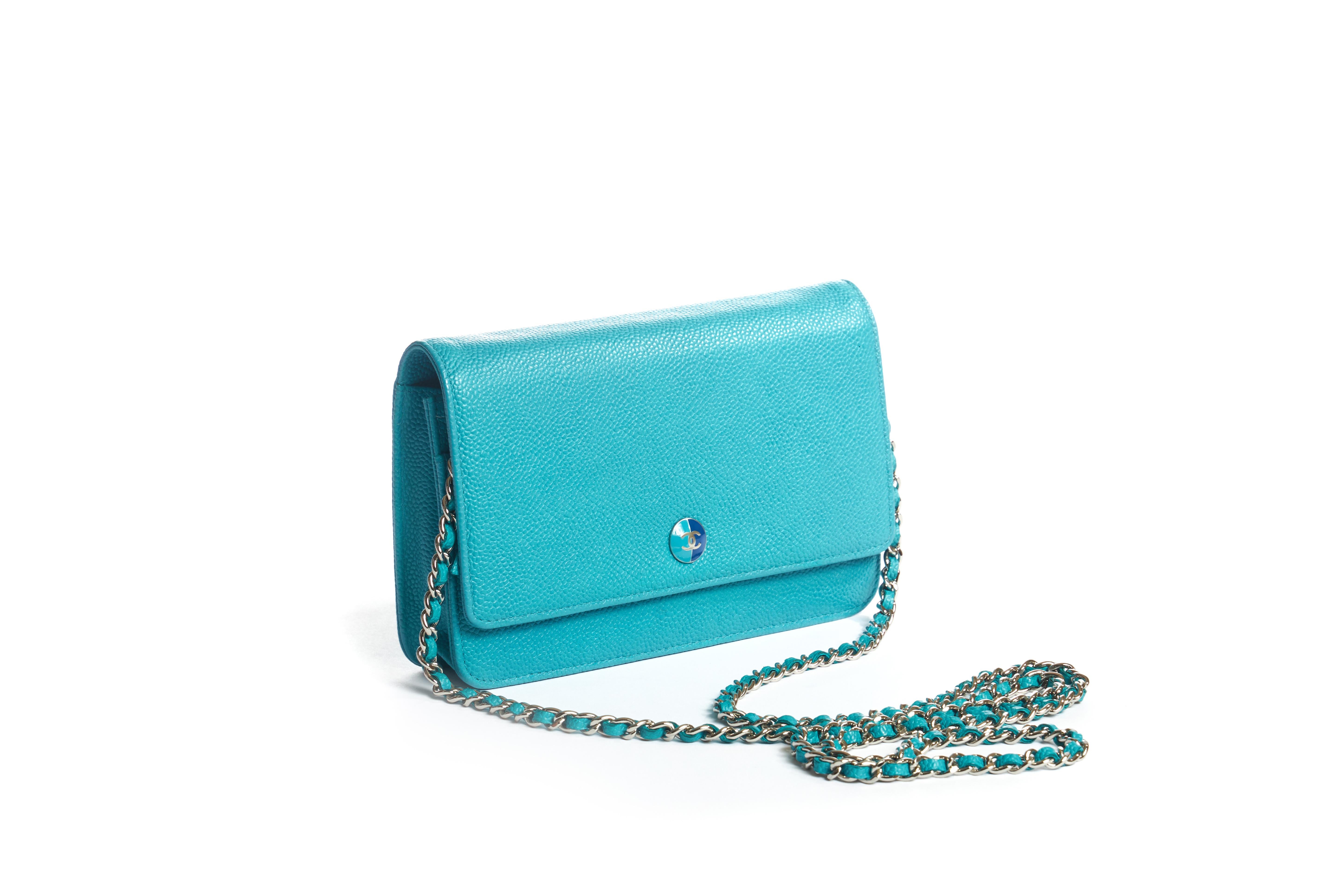 Chanel excellent condition two tone cross body bag. Turquoise caviar leather with electric blue interior. Shoulder drop 25