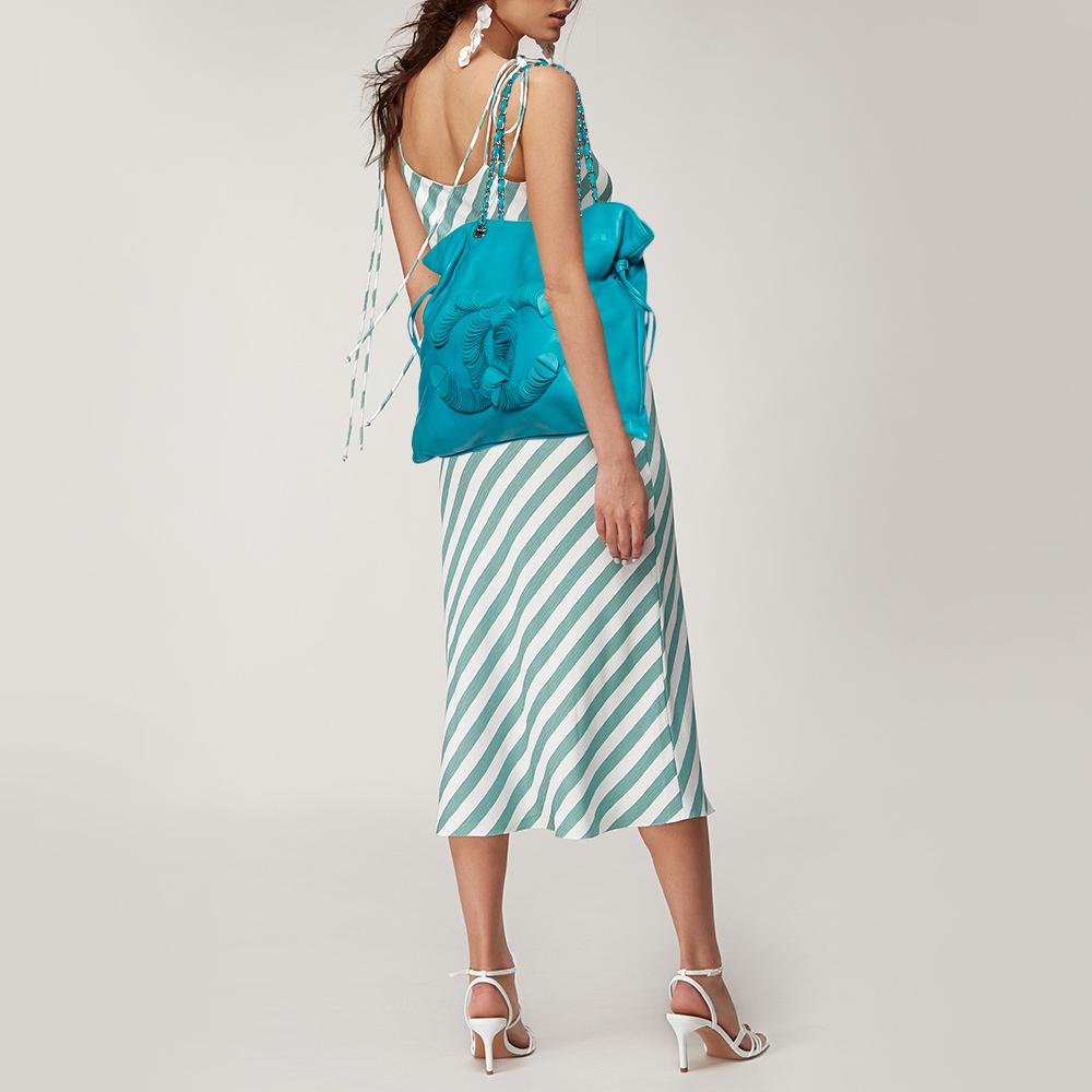 turquoise leather handbag