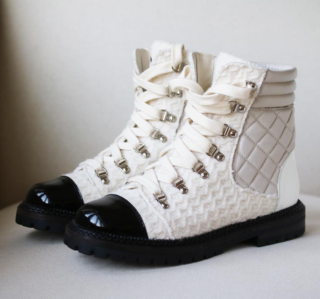 Chanel ivory, blush and white tweed and lambskin leather boots. 
Tonal black patent-leather CC logo on the flap. 
Patent leather toe cap.
Lace up. 
Colour: Ivory. 
Does not come with a box. 

Size: EU 39 (UK 6, US 9)

Condition: New without box. 