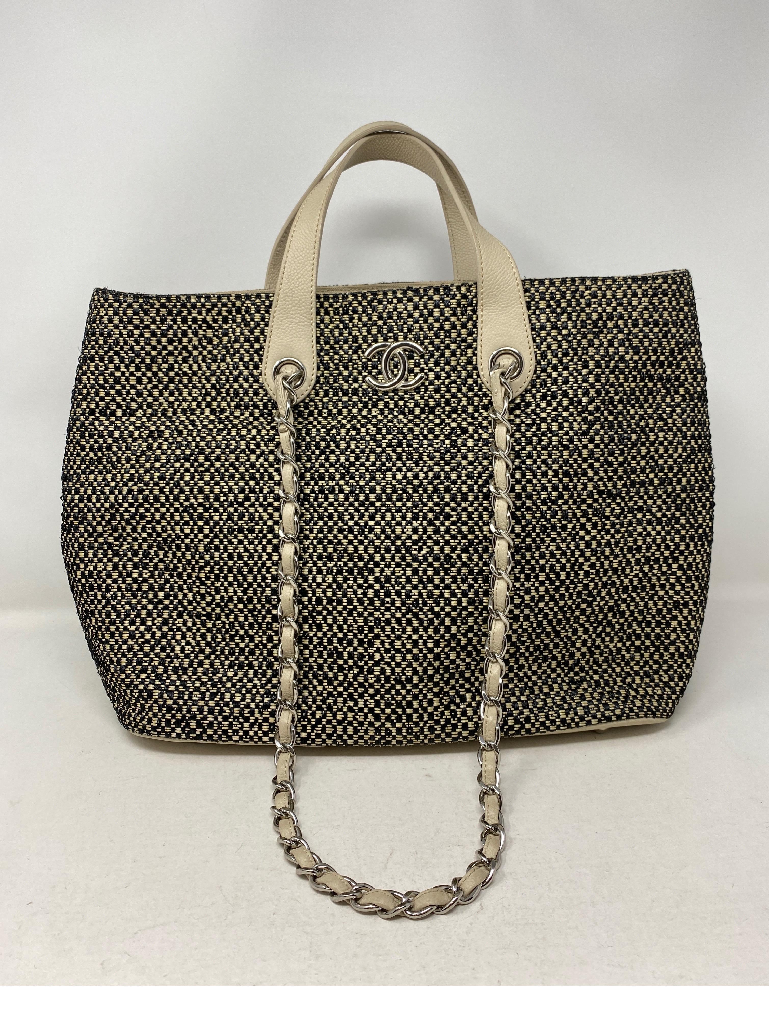 Chanel Tweed Cotton Tote Bag. Excellent like new condition. Leather straps and handles. Top can be adjusted like a bucket bag. Versatile bag. Unique style. Authenticity card and dust cover included. Guaranteed authentic. 