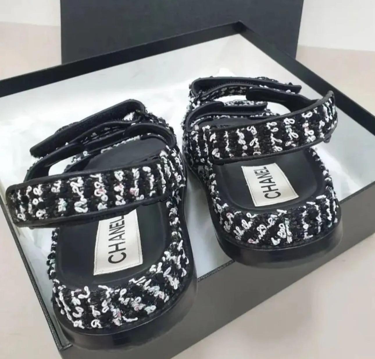 Chanel black & white tweed dad sandals with crystal embellished cc logo 
Sz.38.5
No box. No dust bag