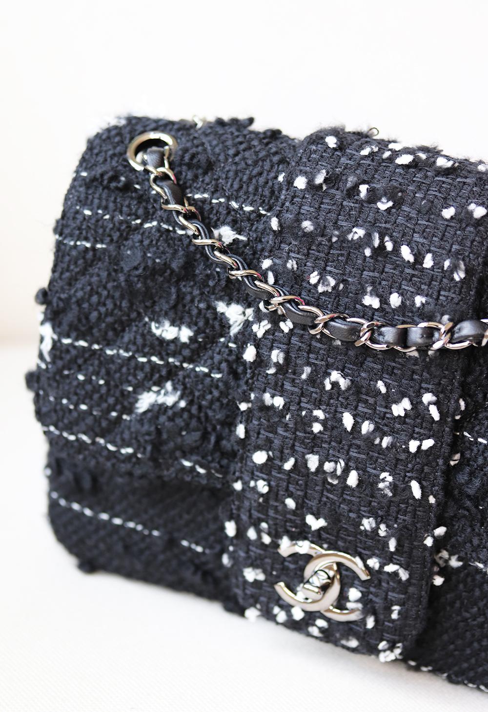 Chanel Tweed Elementary Chic Flap Bag has been hand-finished by skilled artisans in the label's workshop.
Boasting a quited textured-tweed exterior, this design is accented with silver-toned and black lambskin-leather chain strap.
Made in France