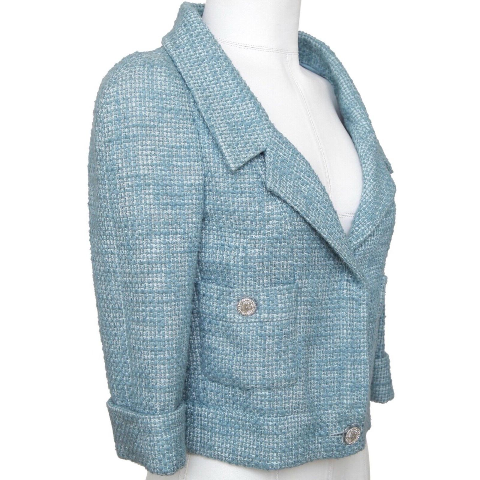 GUARANTEED AUTHENTIC CHANEL CRUISE 2013 CROPPED BLUE TWEED JACKET


Design:
- Cropped lightweight tweed jacket in a fresh blue color.
- Notched lapel.
- Dual patch pockets.
- Strass crystal and celadon buttons.
- Concealed front zipper closure.
-