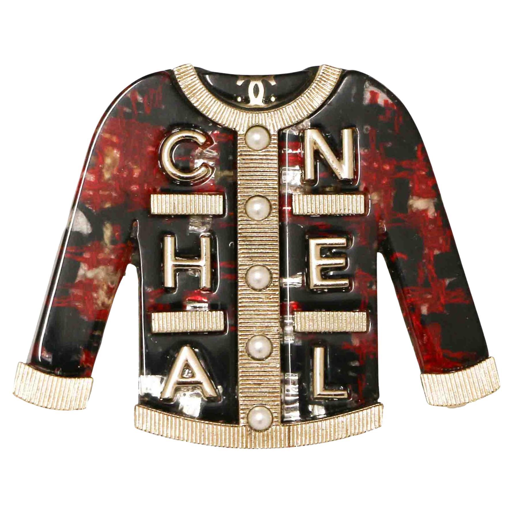 CHANEL Tweed Jacket  C H A N E L Brooch 