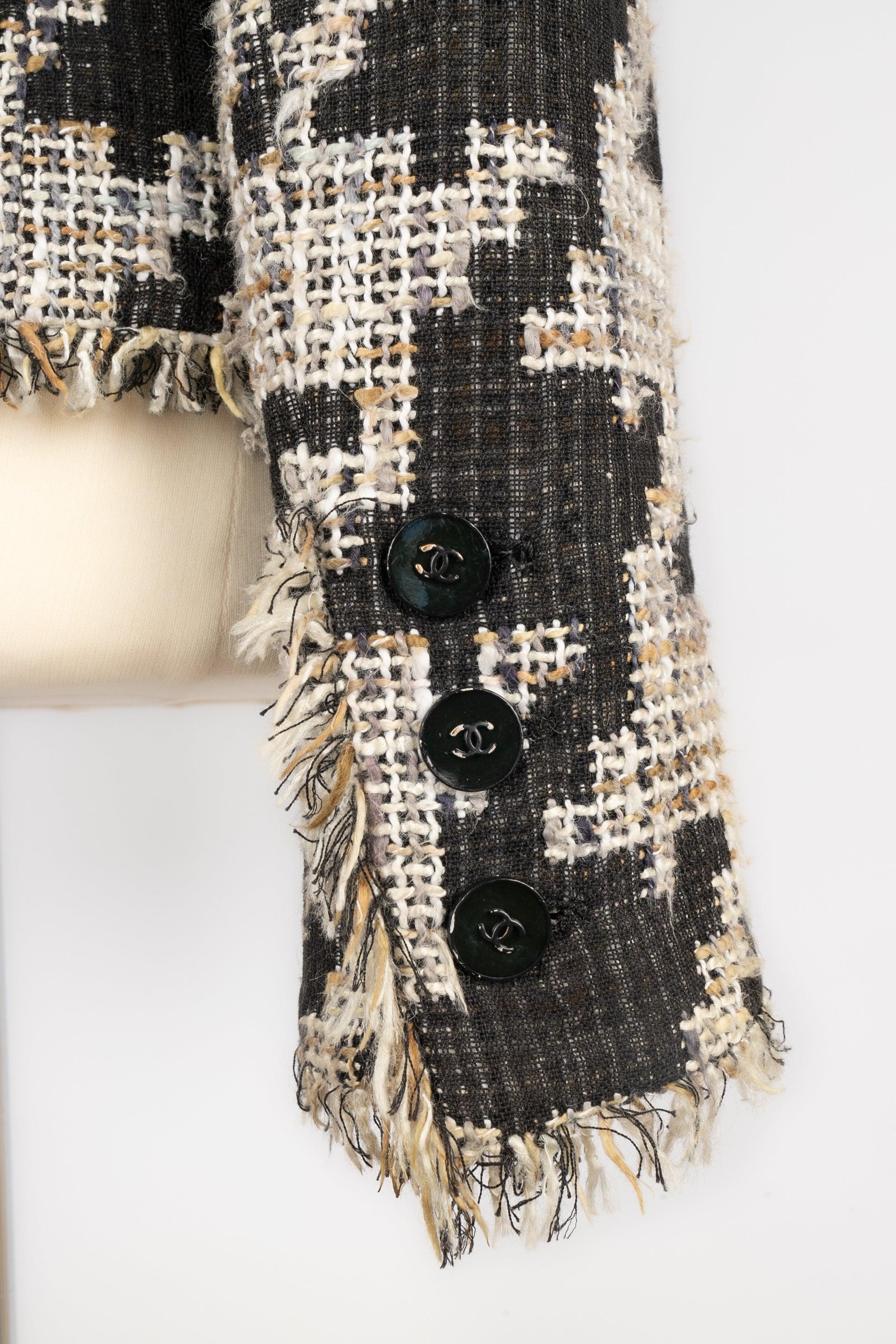 Giacca Chanel in tweed con fodera in seta, 2005 In condizioni ottime in vendita a SAINT-OUEN-SUR-SEINE, FR