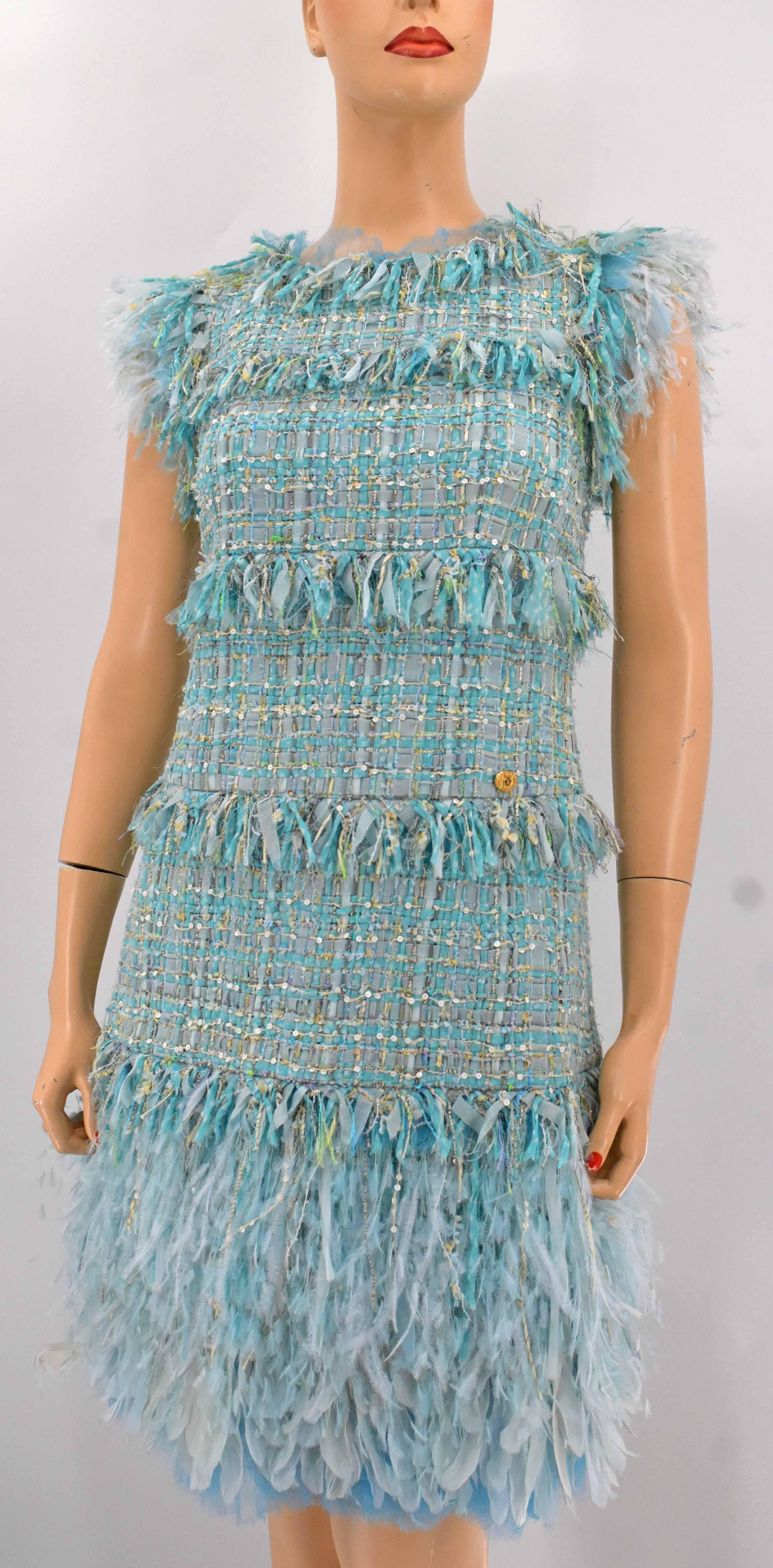 Chanel rare runway fringe dress with jeweled belt. This is from Chanel Spring 2011 runway collection. It is new with tag and fabric swatch.  It retails $14,310 before tax. 