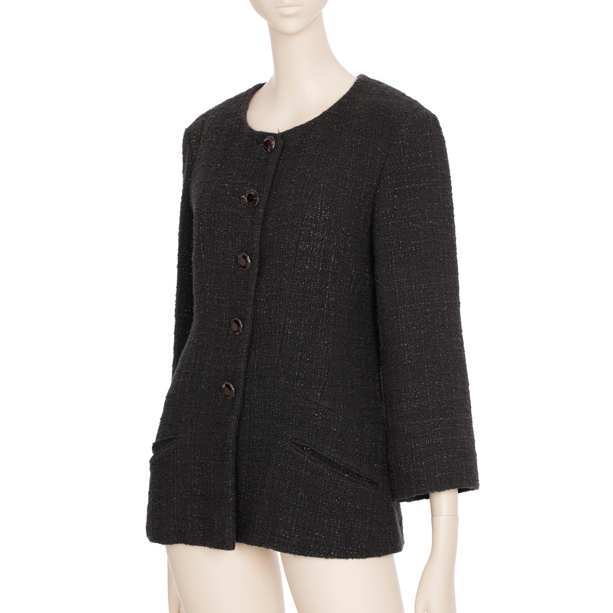 This Chanel Tweed Multi-button Crew Neck Jacket is an exquisite piece. Crafted from a wool tweed blend and featuring burgundy crystal buttons, it will make a timeless addition to any wardrobe.

Brand: Chanel

Product: Multi-button Crew Neck
