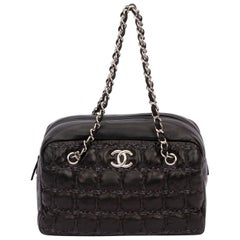 Sac à bulles Chanel en tweed sur point carré