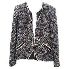 Giacca Chanel in tweed e shearling