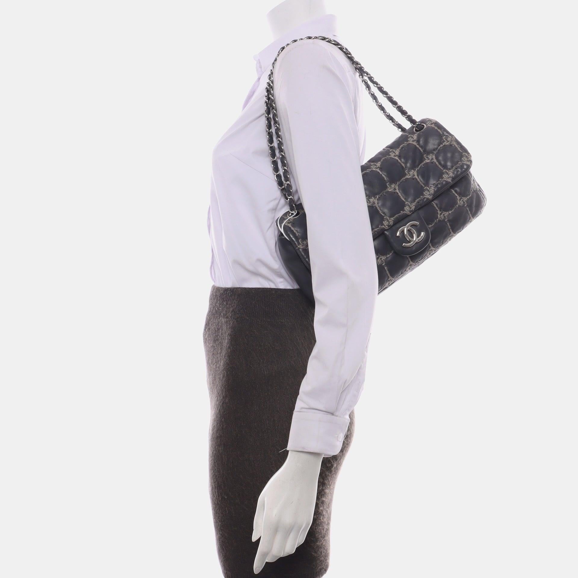 Chanel Tweed Square Stitch on Leather Bubble Grey Medium Shoulder Bag
These are professional photos of the actual bag.
  CONDITION: VERY GOOD CONDITION
  Some signs of use. Light stains on the exterior, corners, interior. Light scratches to the