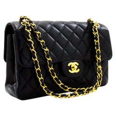 CHANEL Zweiseitige Umhängetasche mit Kette und Klappe, schwarz, gesteppt