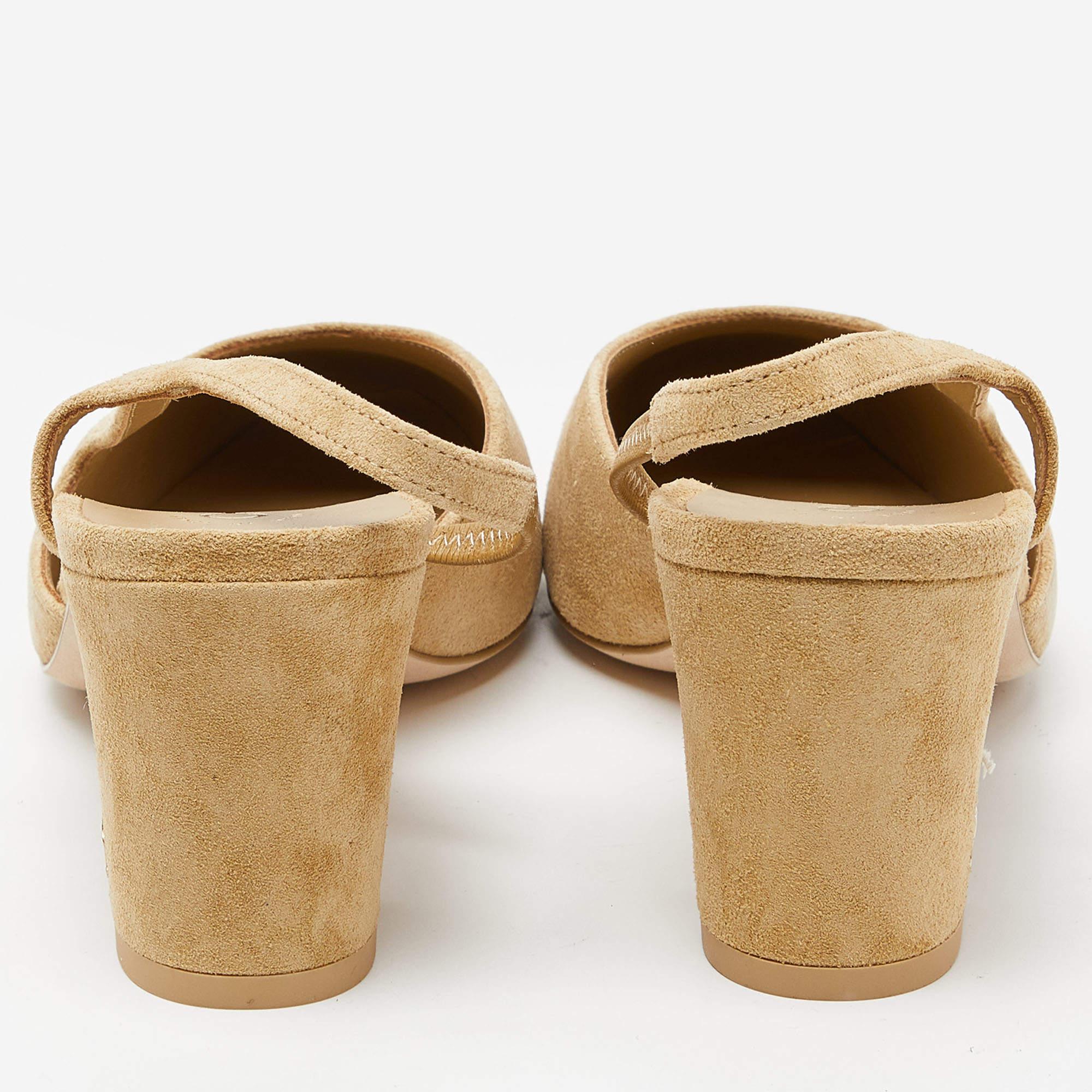 These sandals from the House of Chanel will add a chic touch to your attire. They are created using two tone beige exterior. They flaunt cap toes, a slingback, and block heels. Stay stylish all day with these Chanel sandals.

Includes: Original