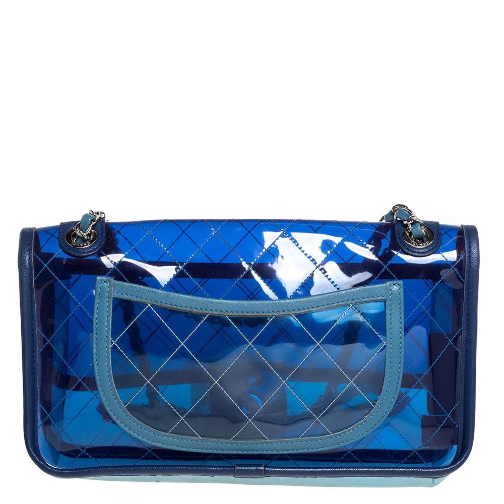 We are in utter awe of this flap bag from Chanel as it is appealing in a surreal way. Creatively crafted from PVC and leather in their quilt design, it bears their signature label on the PVC interior and the iconic CC turn-lock on the flap. The