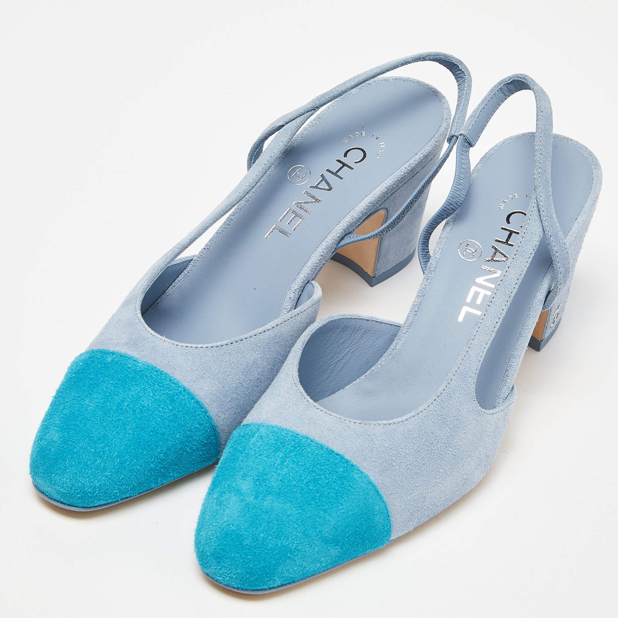 These sandals from the House of Chanel will add a chic touch to your attire. They are created using two tone blue exterior. They flaunt cap toes, a slingback, and block heels. Stay stylish all day with these Chanel sandals.

Includes: Original