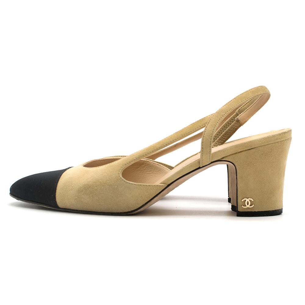 Chanel Two-Tone Suede & Grosgrain Sling-Back Pumps

- Black ribbed fabric on pointed, rounded toe 
- Gold hardware logo on outside of heel
- Expandable elastic slingback
- Open interior and exterior of outside of foot

Please note, these items are