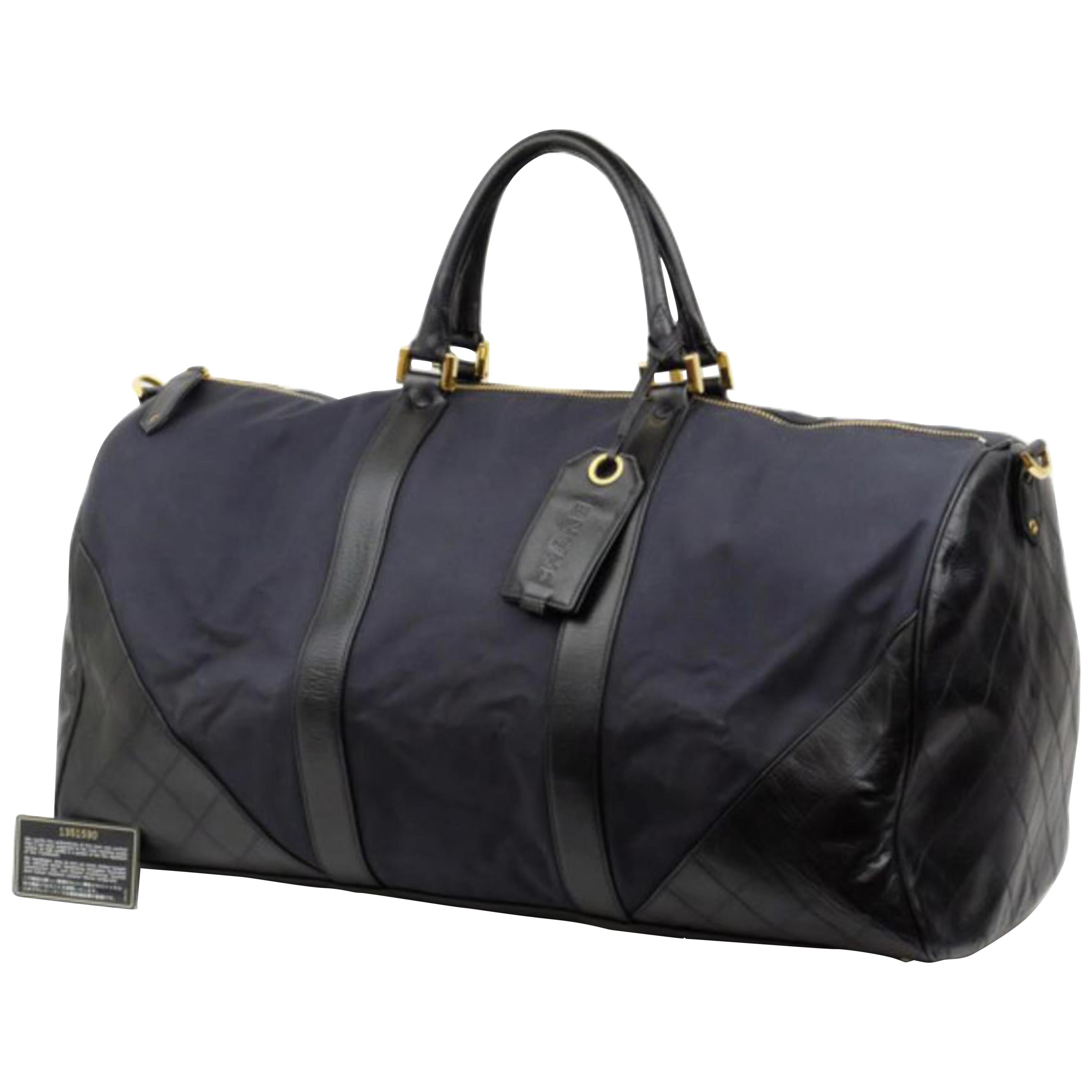 Chanel ( Ultra Rare ) Quilted Bicolor Duffle 226028 Navy X Black Travel Bag For Sale