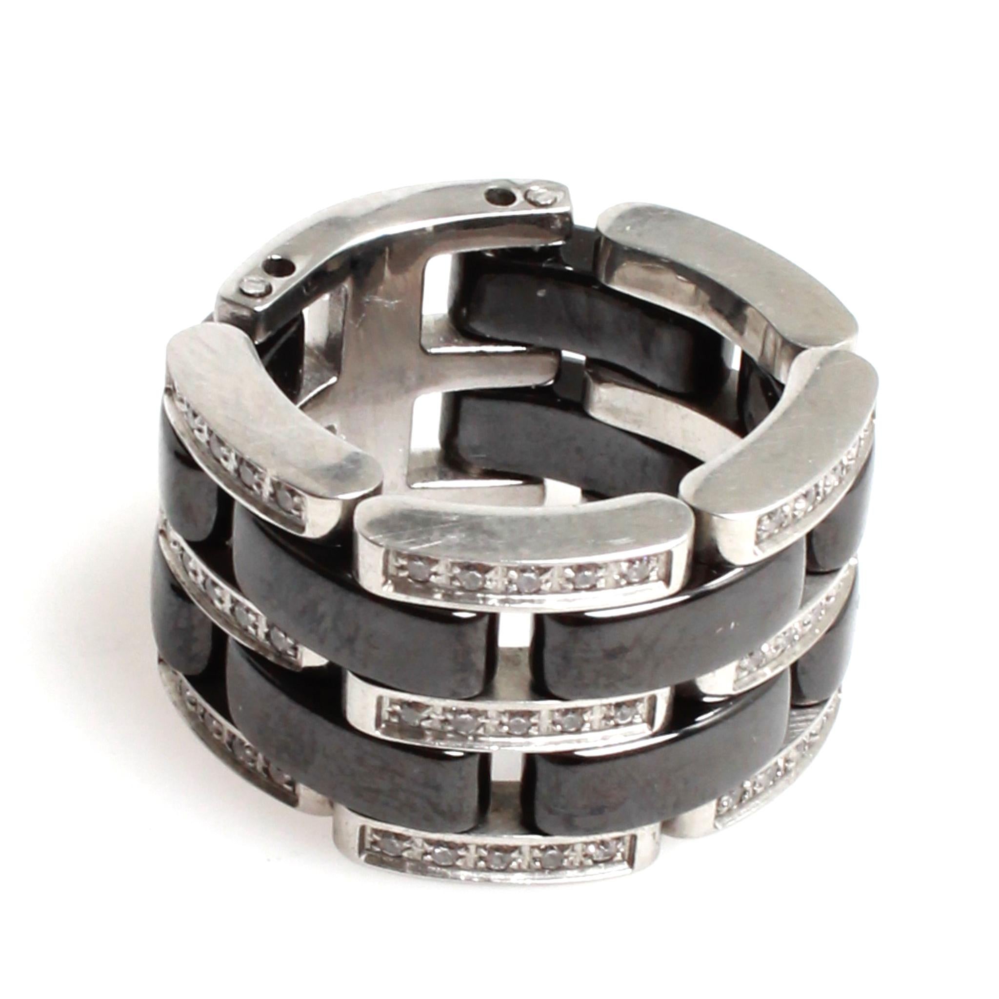 CHANEL Ultra ring. A flexiable black ceramic ring by Chanel with 60 diamonds. Size L.
