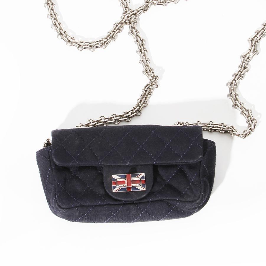 Chanel by Karl Lagerfeld Mini Classic Flap Handbag 
Chanel Métiers d'Art Pre-Fall 2008 
Made in France 
Limited edition reissue 
Navy Blue 
Quilted cotton jersey
Silver toned hardware 
Silver tone dual Venetian chain-link shoulder strap 
Madmoiselle
