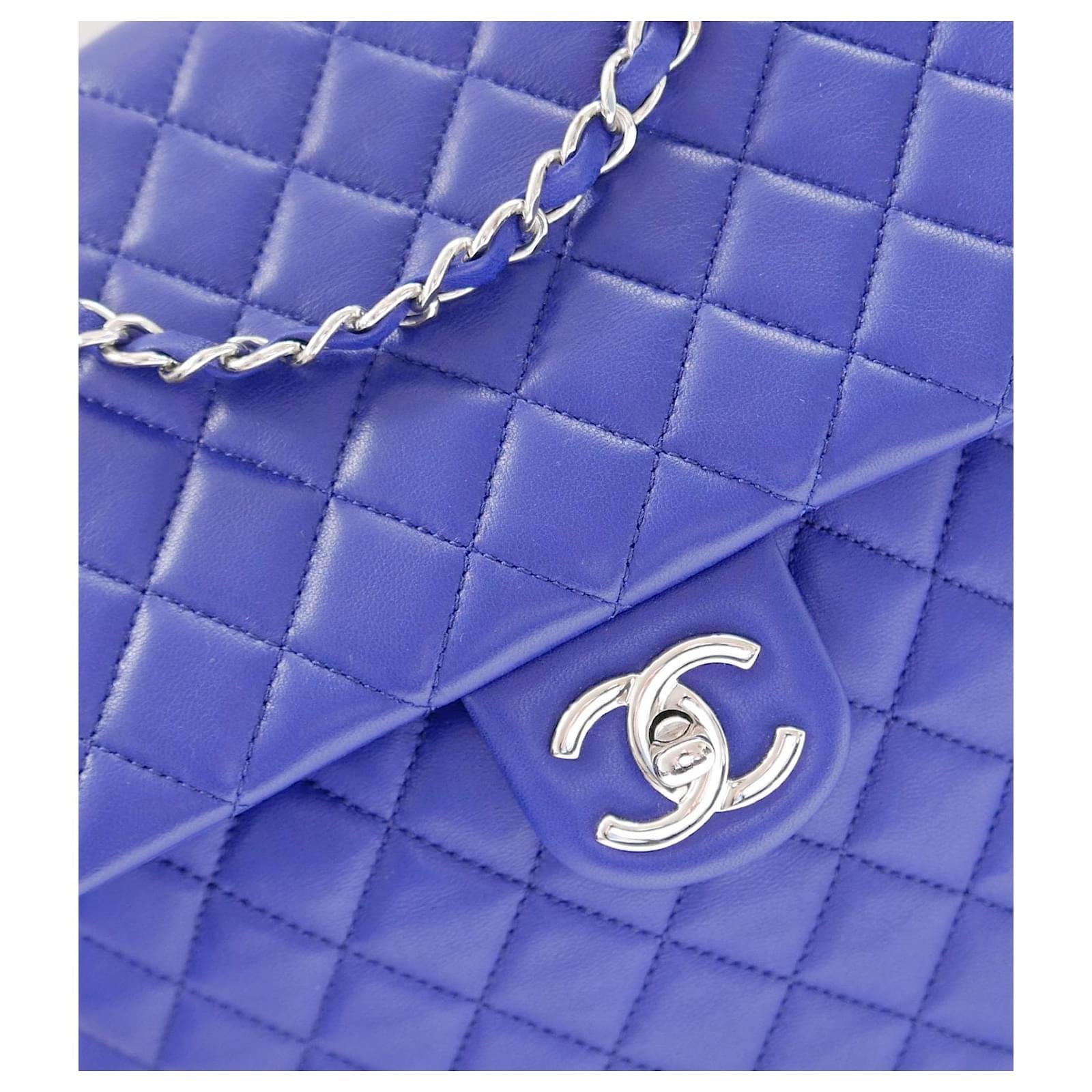 Super cool Chanel Urban Spirit backpack - worn once and comes with authenticity card and dustbag. Made from bright blue lamb leather with signature diamond quilting, it has silvertone CC turn lock flap and chain link top handle and two leather