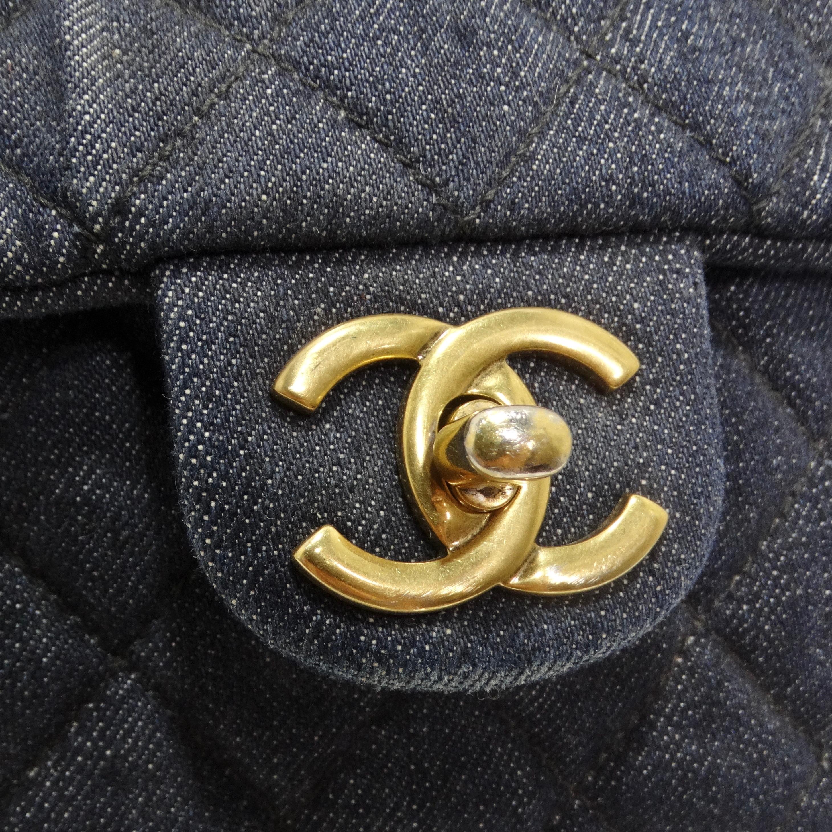 Do not miss out on a backpack that's not just an accessory, but a fashion statement - the Chanel Urban Spirit Quilted Denim Backpack in Dark Blue. This stylish backpack is beautifully crafted from diamond-quilted washed denim in blue, featuring gold