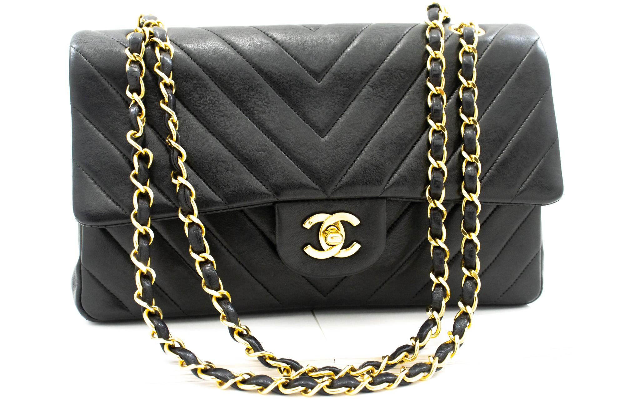 An authentic CHANEL V-Stitch Double Flap Medium Chain Shoulder Bag Black Lamb. The color is Black. The outside material is Leather. The pattern is Solid. This item is Vintage / Classic. The year of manufacture would be 1991-1994.
Conditions &