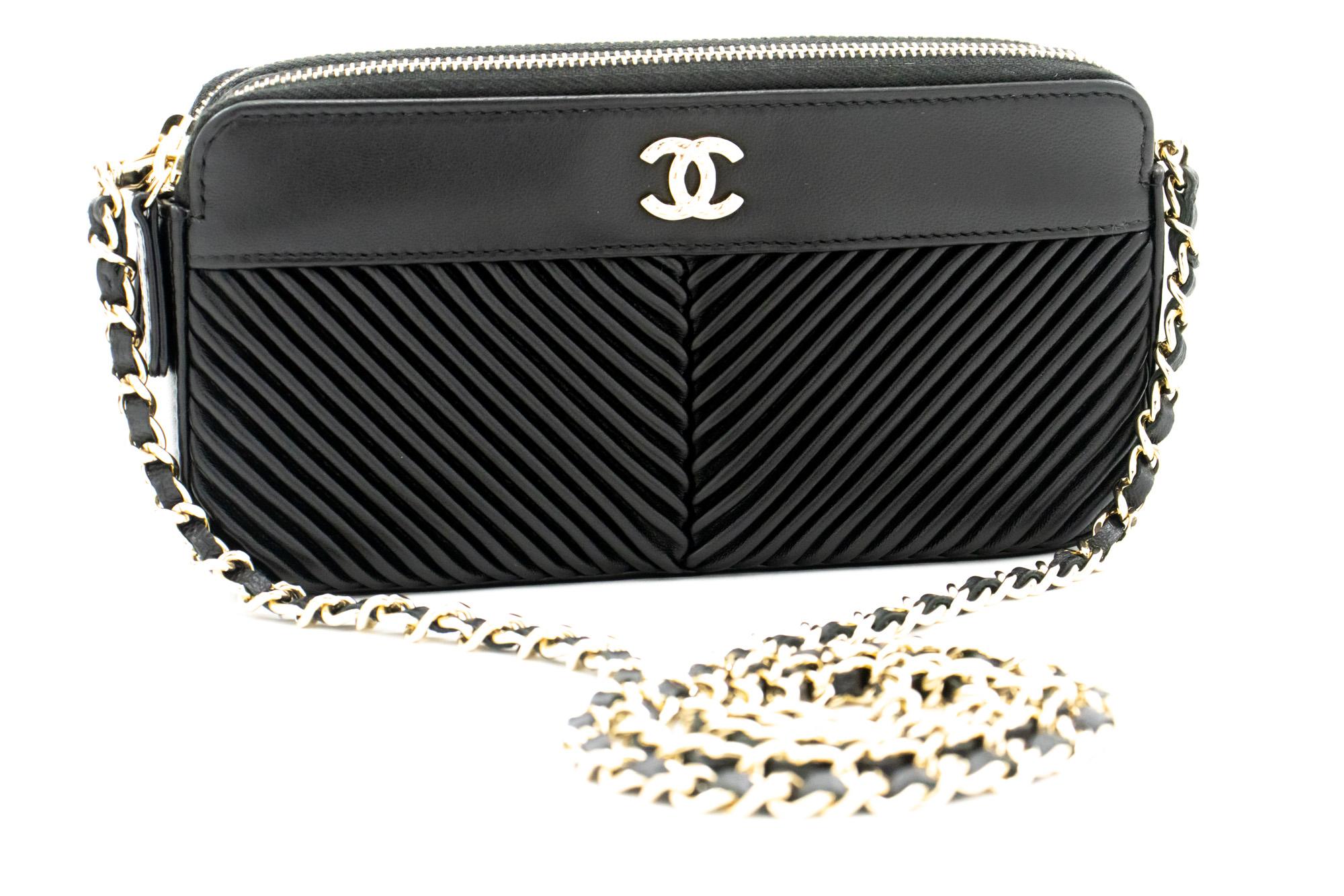 An authentic CHANEL V-Stitch made of black Lambskin Wallet On Chain WOC Double Zip Chain Bag. The color is Black. The outside material is Leather. The pattern is Solid. This item is Contemporary. The year of manufacture would be 2019.
Conditions &