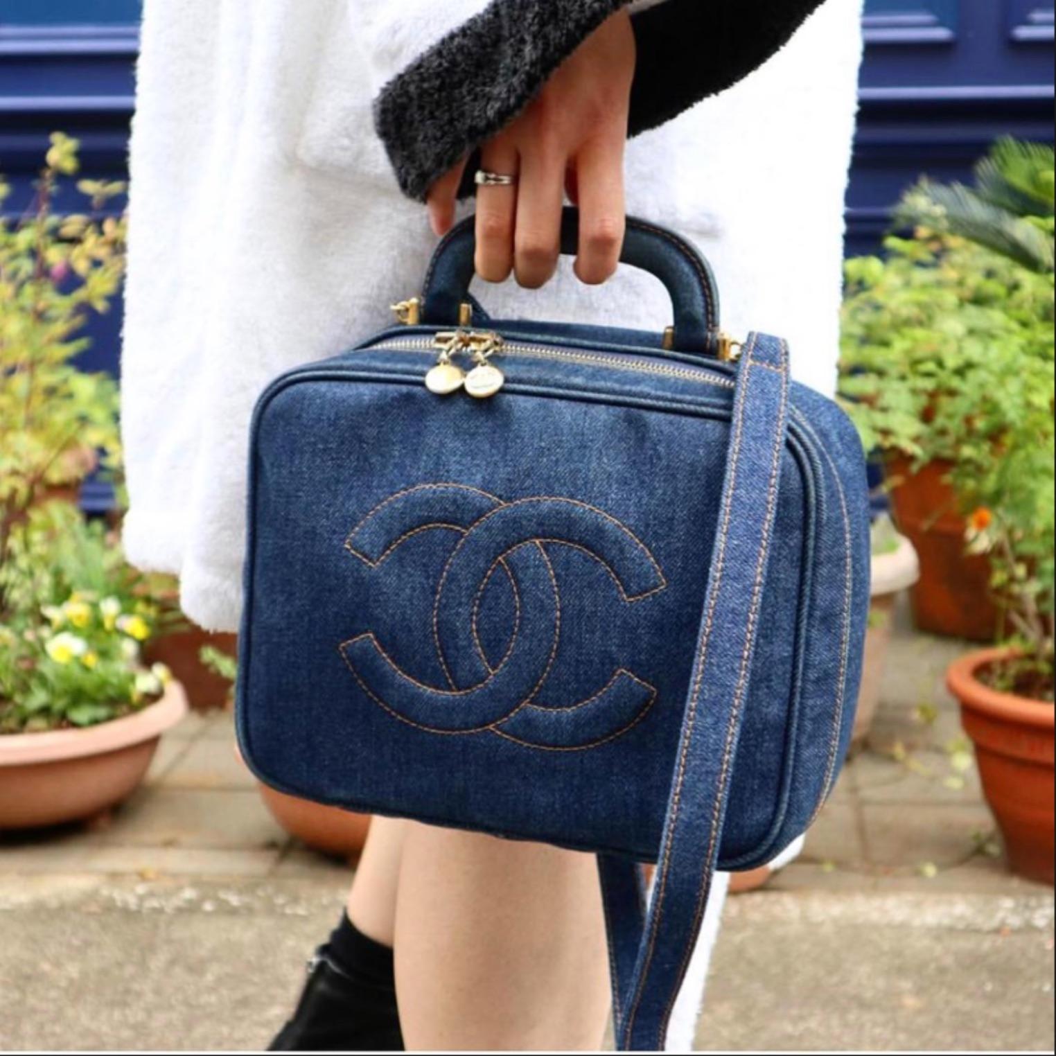 Chanel Rare Vintage Denim Blue Mini Vanity Case Crossbody Bag 

Year: 1996 {VINTAGE 25 Years}
Gold Hadware
CC Stitched Logo at front
Top handle
Detachable crossbody strap
Zip around closure
Main zippered interior pocket
Removable strap
7.1