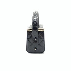 Chanel Vanity Case Vintage in pelle verniciata nera con chiusura argentata