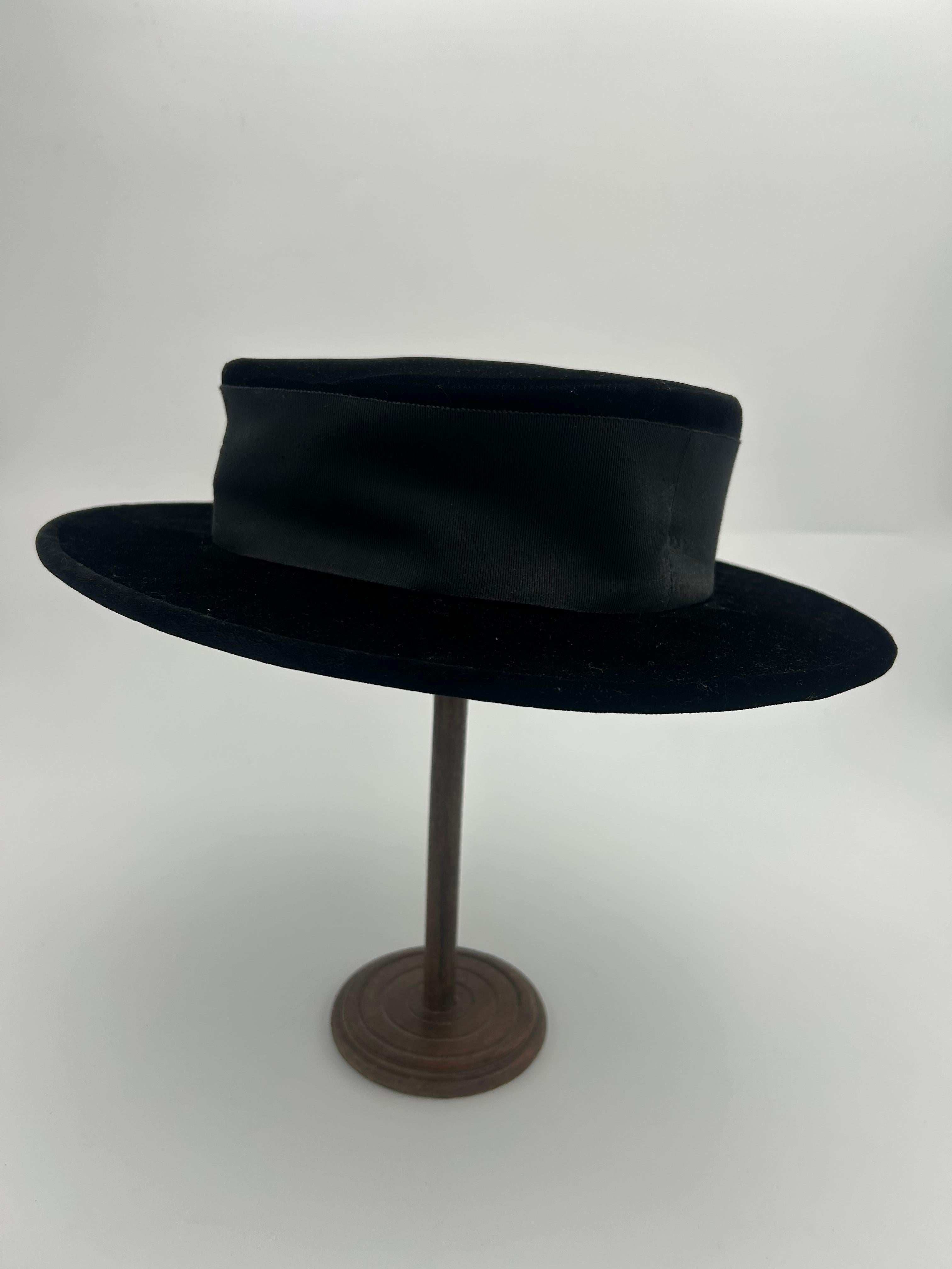 Chanel Velvet Black Hat. Beautiful classy Chanel hat, perfect to elevate any outfit this hat is comfortable and chic. This hat really represent Coco Chanel and everything that she designed making this a really sought after piece among collectors.