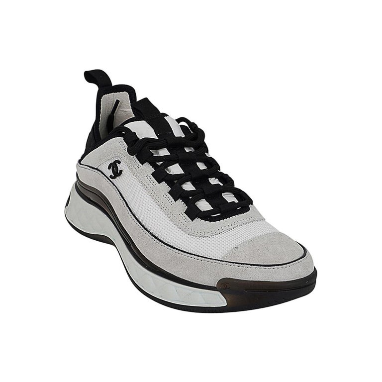 Chanel Baskets CC en cuir de veau et fibres mixtes, blanches et