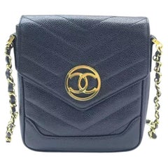 Chanel Vertical Mini Chevron Quilted Black Caviar Leather Crossbody Bag