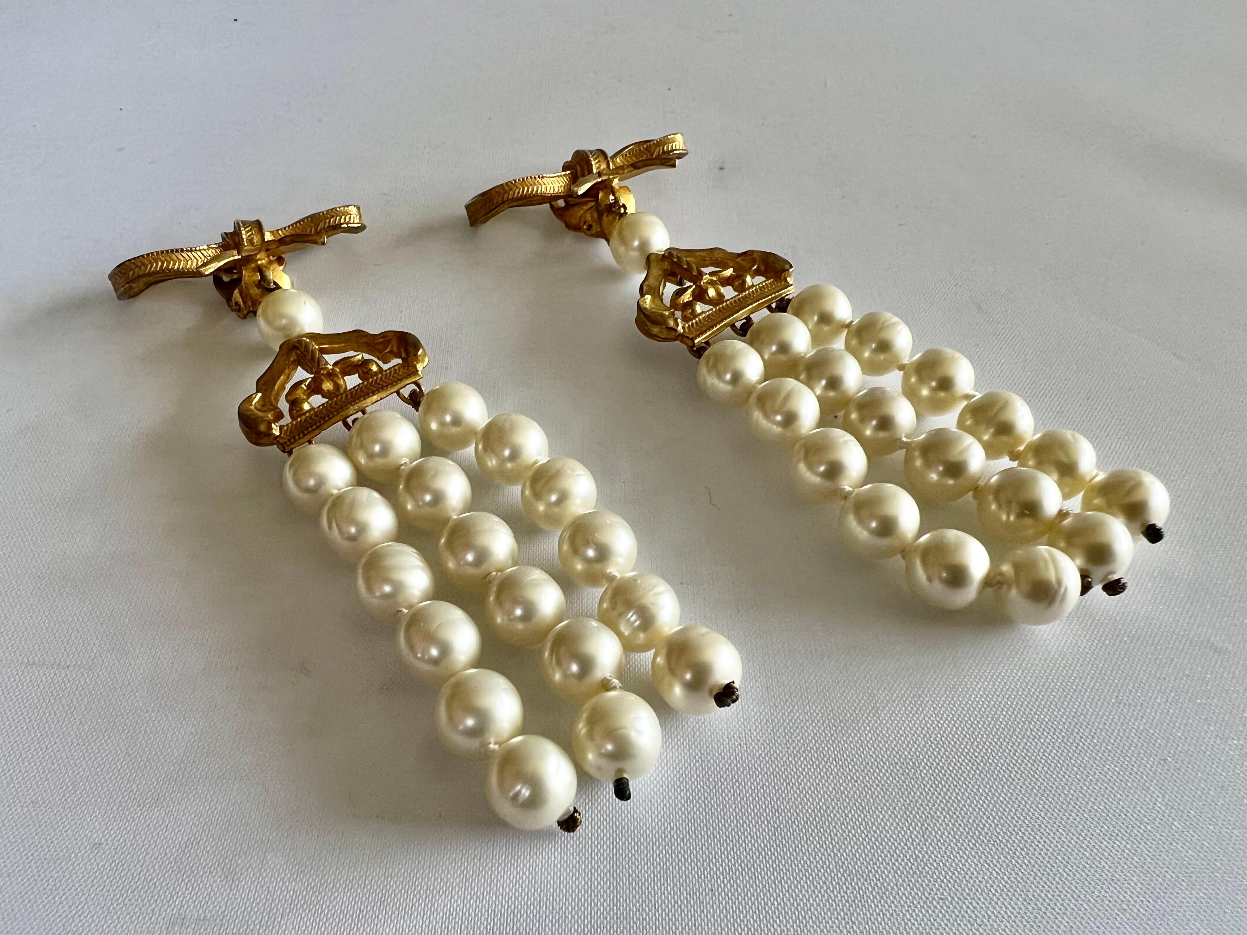 Bead Chanel Vintage 1970s Gold Bow Pearl Chandelier Earrings  For Sale